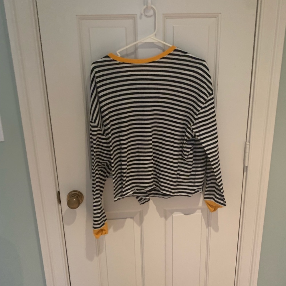 Black and white striped longsleeve shirt.